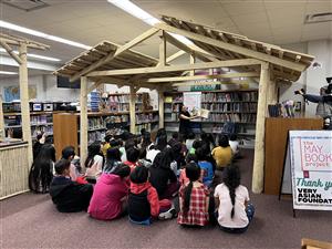 Children listening to a story in a school library