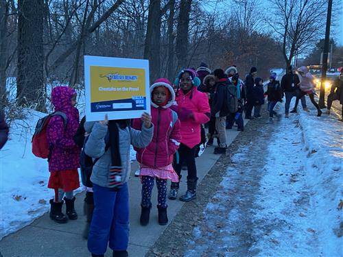 Students at Chelsea Heights walk to school  on a winter morning. 