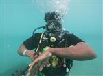Emmanuel (Bayo) Ifonlaja scuba diving in Cartagena Colombia 