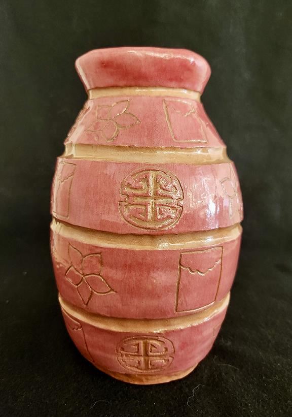 Ceramic vase with symbols