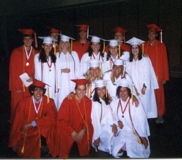 Here are the EXPO alumni, recently graduated from St. Paul's Highland High School. Notice all the honors cords and tassels!