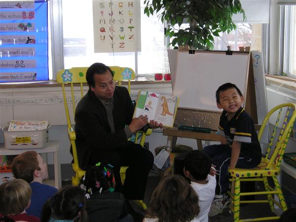 Chuecheng's dad reads a story for his birthday.